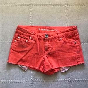 Orange denim shorts